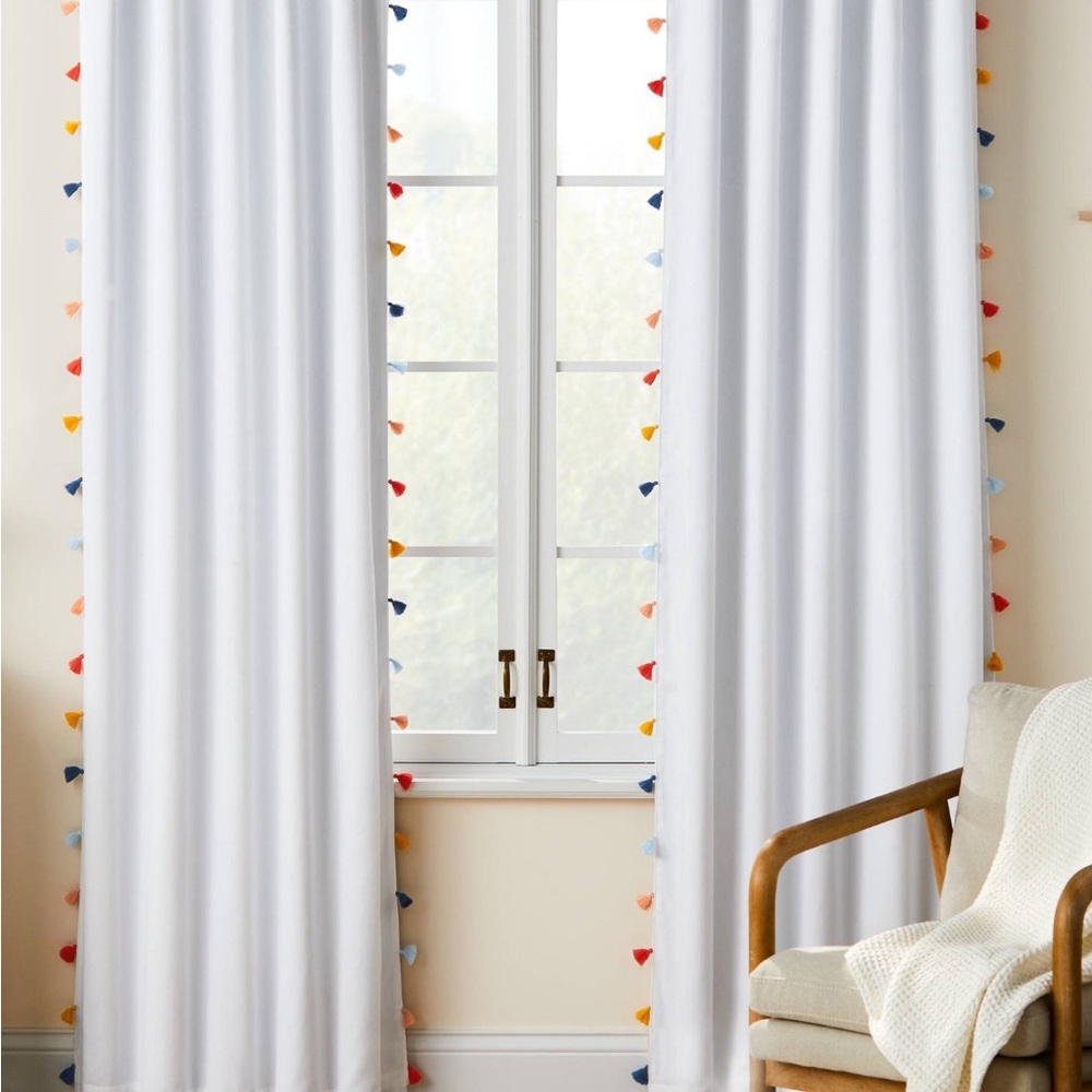 White Curtains with Colorful Tassel Accents